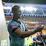 Zac Lomax poses with fans after the first State of Origin, 2025
