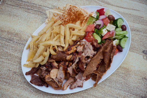 The yeeros plate with fresh-cut chips and Greek salad. 