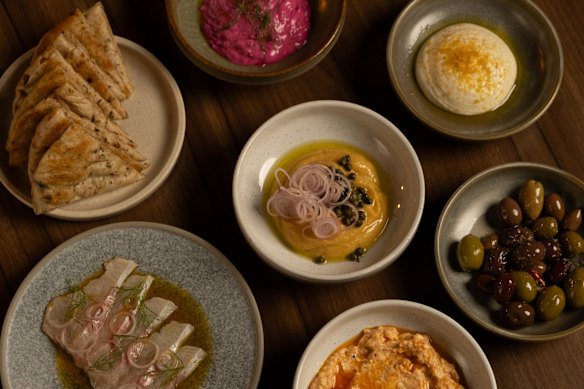Meze plates include taramosalata dip, green chilli kingfish and tirokafteri.