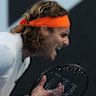 Stefanos Tsitsipas of Greece reacts during his second round match against Tomas Machac of the Czech Republic at the Australian Open tennis championship in Melbourne, Australia, Thursday, Jan. 22, 2026. (AP Photo/Dar Yasin)