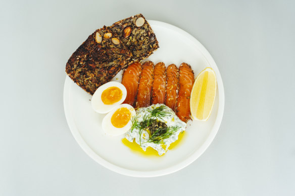 Breakfast plate with za’atar, ocean trout, boiled egg and mountain
bread.