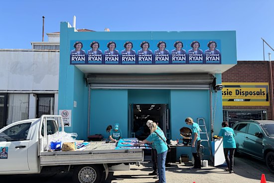 Monique Ryan’s campaign staff and volunteers prepare pre-poll and election-day material. 