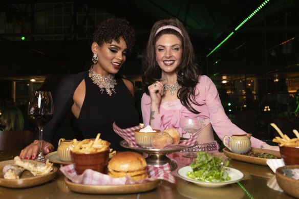 Diners enjoy dinner at the chef’s table at the Emerald Room  in Darlinghurst which offers a dining experience with a burlesque show.