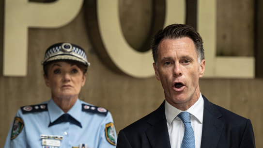 Premier Chris Minns and Police Commissioner Karen Webb speak on Thursday. 