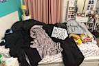 The mountain of clothes on my bed only continued to grow as I put off organising.