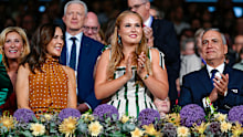 Queen Mary of Denmark, left, and Crown Princess Amalia of the Netherlands stand in the VIP box during the Equestrian World Championships opening ceremony Tuesday, Aug. 11, 2026, in Aachen, Germany.