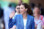 Catherine, Princess of Wales waves to fans.