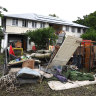 Six Townsville buildings looted after residents fled rising waters