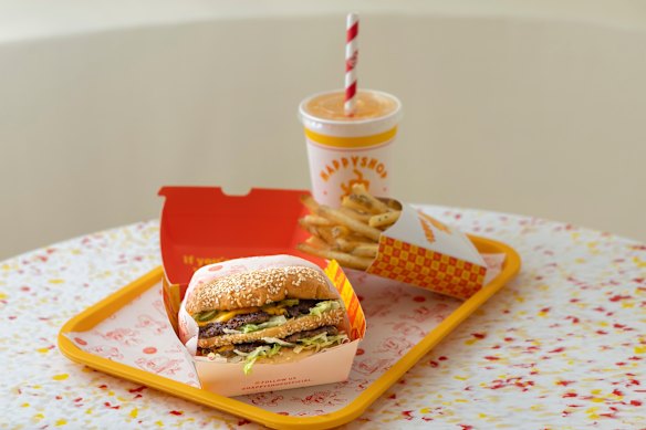 The BIG Happy burger with fries. 