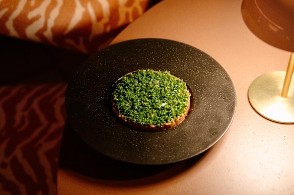 Wagyu beef tartare with yuzu kosho and chives.