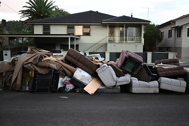 Discarded furniture outside a flood affected property on March 02, 2022 in Lismore, Australia. Several northern New South Wales towns have been forced to evacuate as Australia faces unprecedented storms and the worst flooding in a decade. (Photo by Dan Peled/Getty Images)