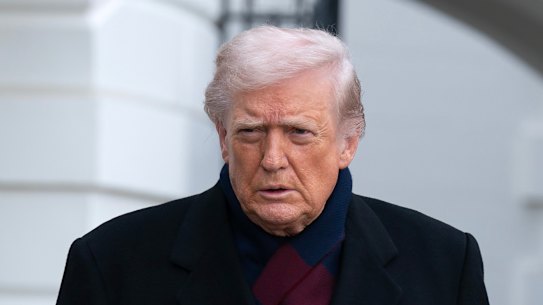 President Donald Trump talks to reporters on Saturday outside the White House. 