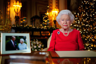 The Christmas message is pre-recorded on December 23. The photograph on the desk is of The Queen and the Duke of Edinburgh, taken in 2007 at Broadlands, Hampshire, to mark their Diamond Wedding Anniversary.