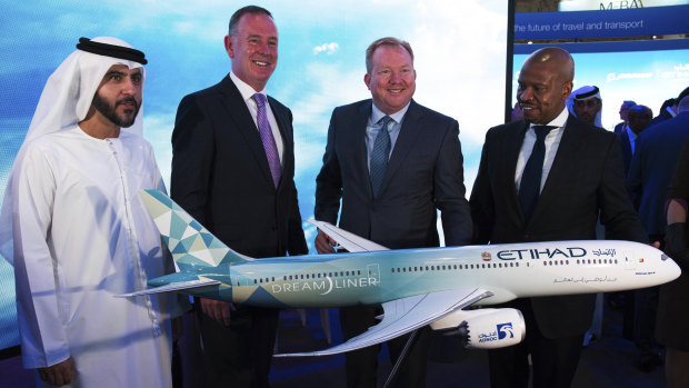 Etihad COO Mohammad al-Bulooki, Etihad CEO Tony Douglas, Boeing Commercial Airplanes president and CEO Stanley A. Deal and Boeing Global Services President and CEO Ted Colbert in Dubai..