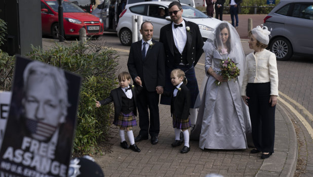 Stella Assange, wearing a wedding dress designed by Vivienne Westwood arrives with her sons Gabriel and Max, dressed in Westwood kilts, and her mother to marry her partner, WikiLeaks founder Julian Assange.