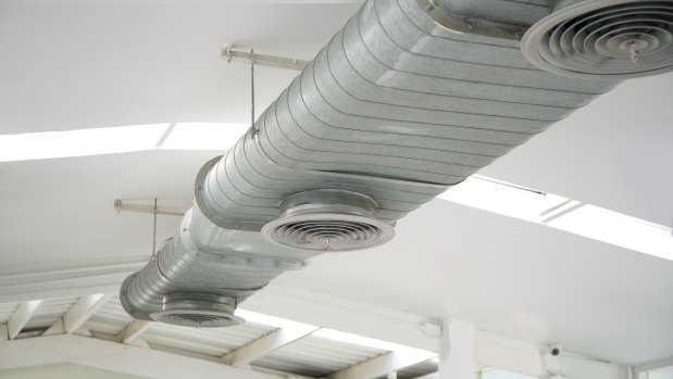 Research suggests office airconditioning systems should be running a few degrees warmer.