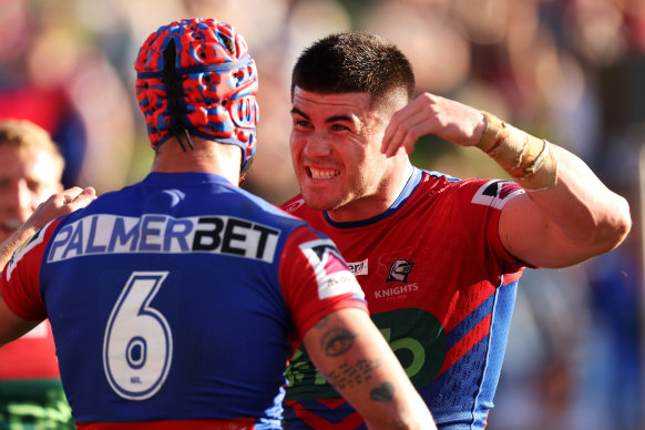 Kalyn Ponga and Bradman Best celebrate one of the latter’s two tries at McDonald Jones Stadium.