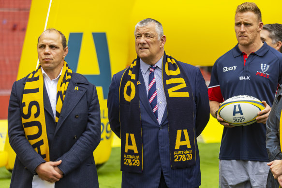 Rugby Australia’s Phil Waugh in 2022 alongside Rugby Victoria president Neil Hay and Reece Hodge, of the Melbourne Rebels.