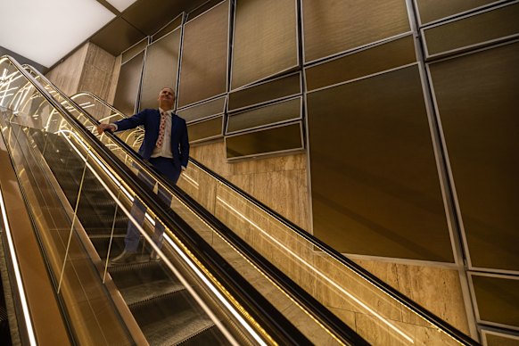 Dexus general manager of development Nicholas Wilkinson next to some of the original window panels that once blocked the view from the offices