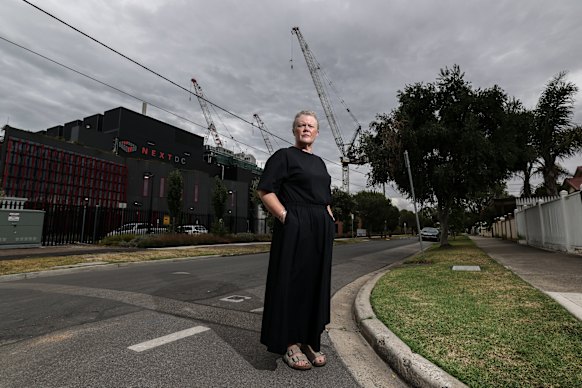 Jacqui Glover and the Next DC data centre that has been built metres from her home.