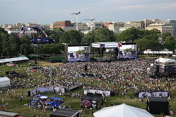Fans attend the UFC Freedom 250 Fan Fest on The Ellipse ahead of the UFC Freedom 250 fight on the South Lawn of the White House.