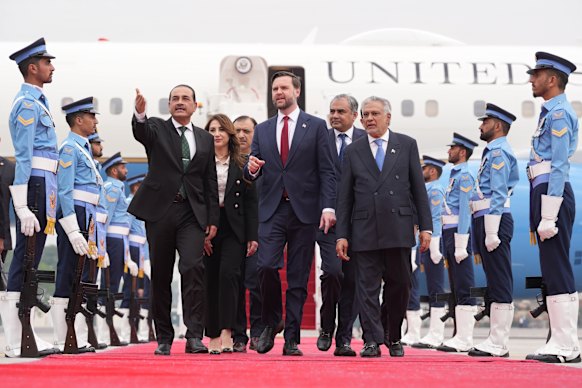 US Vice President JD Vance (centre) walks with Pakistan’s Chief of Defence Forces and Chief of Army Staff Field Marshal Asim Munir (left) as well as Pakistani Deputy Prime Minister and Foreign Minister Mohammad Ishaq Dar after arriving in Islamabad for talks with Iranian officials.