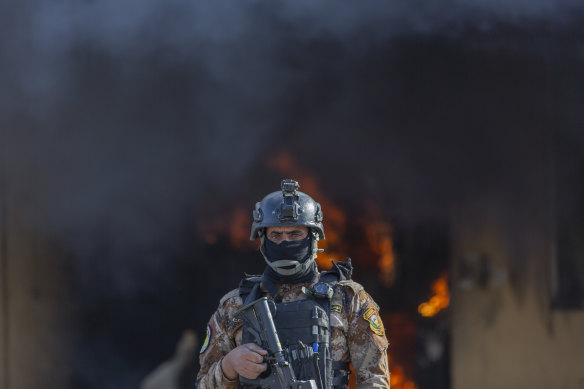 An Iraqi soldier guards the US embassy in Baghdad.