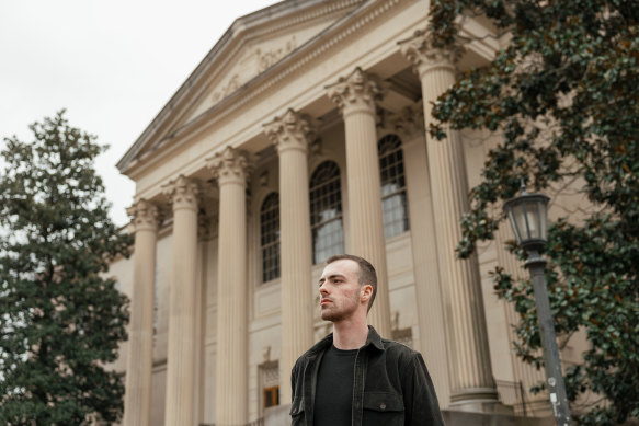 Alexander Denza in front of Wilson Library at the University of North Carolina at Chapel Hill.