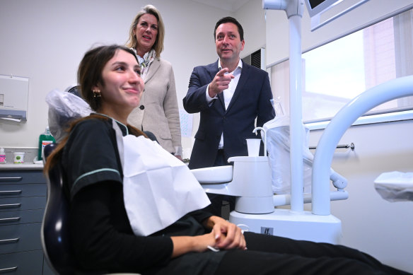 Shadow health minister Georgie Crozier and opposition leader Matthew Guy releasing an election promise at a dental clinic on Thursday.