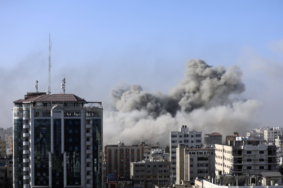 Smoke rises from the Israeli bombardment of Gaza City on Monday.