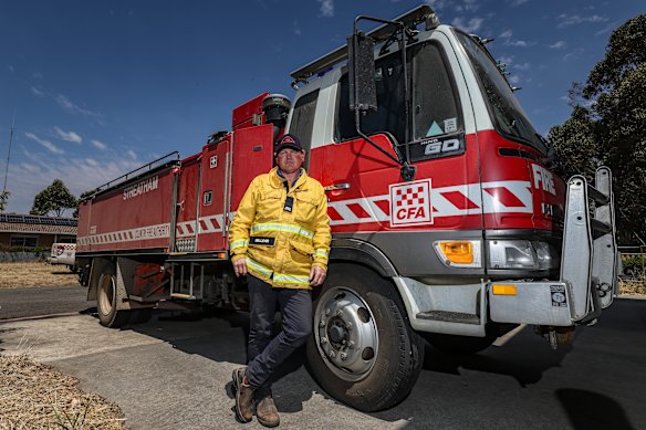 Pat Millear, group officer of Westmere CFA with the Westmere CFA tanker, which is approaching 30 years of age.