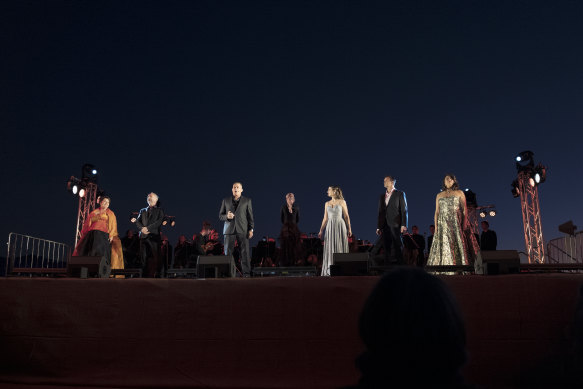 Cast members with conductor Vanessa Scammell and members of the Queensland Symphony Orchestra and The University of Queensland Pulse Chamber Orchestra at last year’s Festival of Outback Opera.