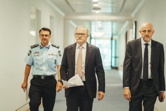 AFP Commissioner Reece Kershaw, Prime Minister Anthony Albanese and Director-General of Security of ASIO Mike Burgess before their press conference at Parliament House this morning. 
