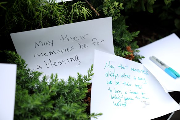 Handwritten notes left at the site of the shooting.
