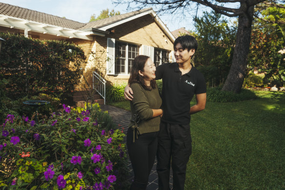 Cathy Cao with her son Jaclyn Yang at her home in Roseville.