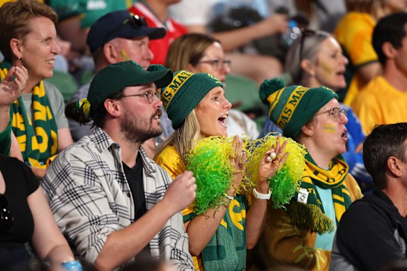 Nervous Matildas fans watch stoppage-time tick down.