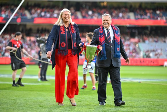 Melbourne Football Club president Kate Roffey and Ron Barassi with the 2021 premiership cup.