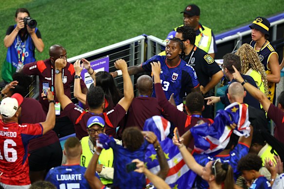 Sidny Lopes Cabral in the stands after his goal. 