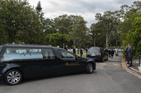 The couple and their unborn son were laid to rest in Brisbane on Monday. 