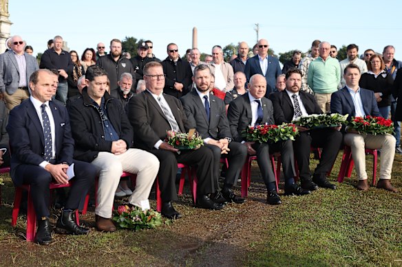 Rugby Australia CEO Phil Waugh (left)  and Lions manager Ieuan Evans (front row, third from right) attended a service at Maitlaind to pay tribute to first captain Robert Seddon. However, Lions players were nowhere to be seen.