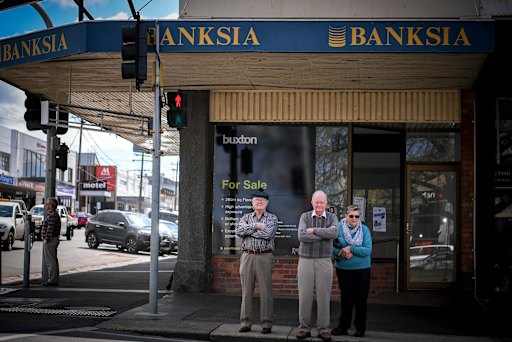 Some of the Banksia victims (from left), Joe Lofts, Keith Pitman and his wife, Susan Pitman, outside the former office in Ballarat in 2019.