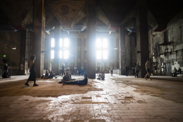 Nightclubs took over the old abandoned buildings in what was once no-man’s-land. Here the building that housed the Berghain club being used for a socially distanced listening party in 2020.