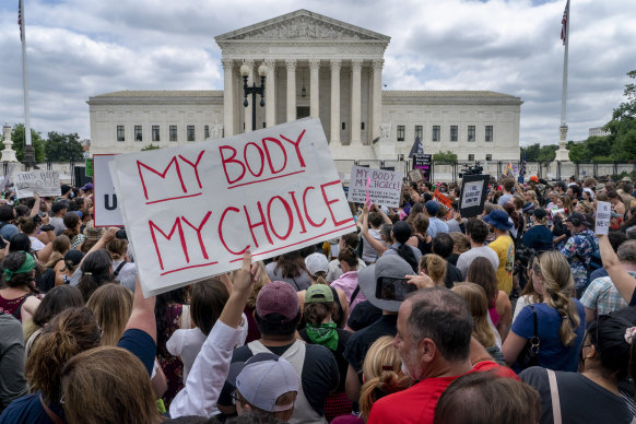 Crowds outside the US Supreme Court after its decision to overturn Roe v Wade on June 24.