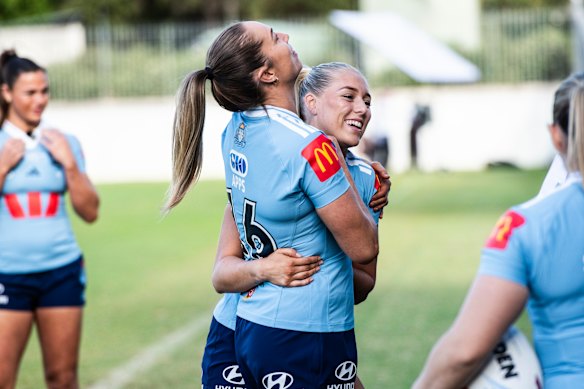 Teagan Berry with NSW teammate Kezie Apps. 