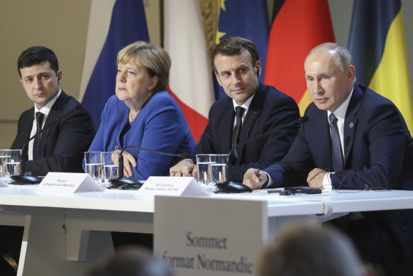 Ukraine’s President Volodymyr Zelenskiy, left, German Chancellor Angela Merkel, French President Emmanuel Macron and Russian President Vladimir Putin, right, in Paris during 2019 peace talks on the Ukrainian-Russian conflict.