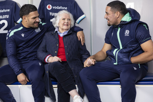 Scotland’s Sione Tuipulotu (L) and Mosese Tuipulotu (R) as they are surprised by their grandmother Jacquelin Thomson at Murrayfield.
