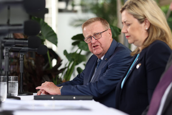 John Coates, with then-premier Annastacia Palaszczuk, has long loomed over Brisbane 2032.