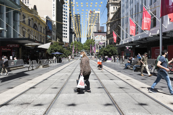 Shoppers in Bourke Street this week.