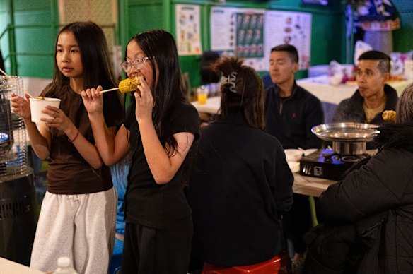 Customers buy food from participating restaurants on the street in Canley Vale. 
