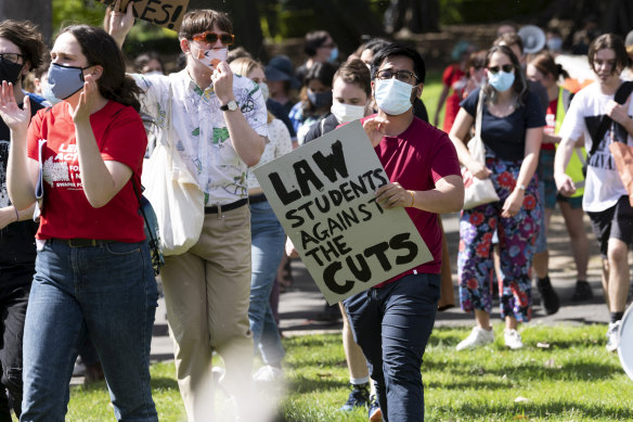 Students initially gathered in groups of less than 20 with differentiated signs, to show they did not have a 'common purpose' in gathering.